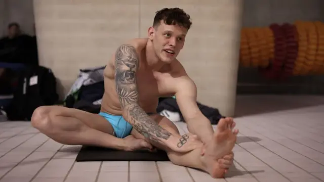 Team GB swimmer Matt Richards stretches