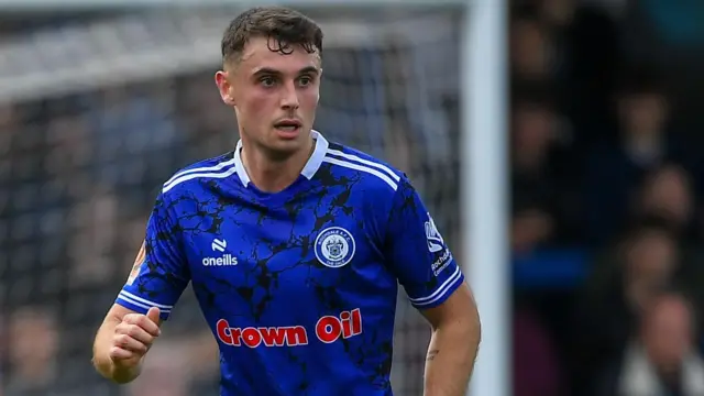 Connor McBride in action for Rochdale