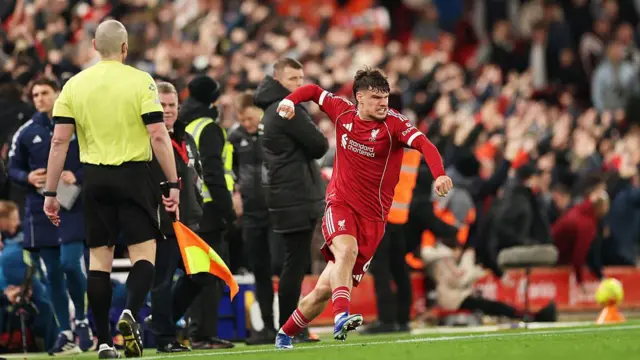 Milos Kerkez of Liverpool celebrates after team Hugo Ekitike scores his team's second goal