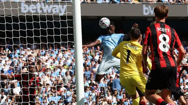  Marc Guehi (C) misses the target with this header 
