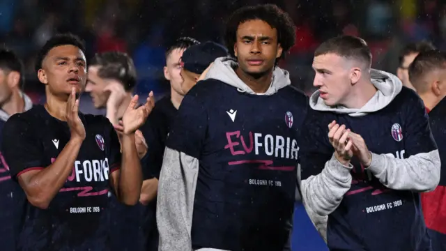 Bologna players Dan Ndoye, Joshua Zirkzee and Lewis Ferguson