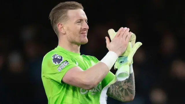 Jordan Pickford applauds fans after draw against Chelsea