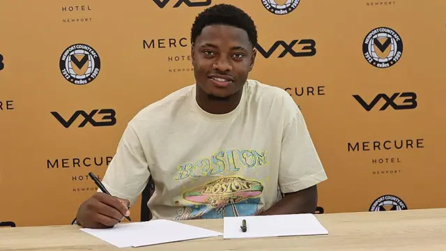 Bobby Kamwa signing for Newport County