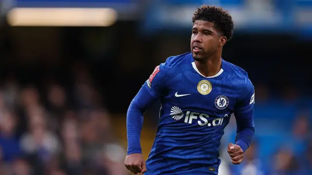 Chelsea's Andrey Santos looks on