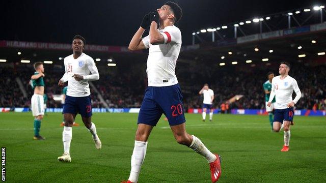 Dominic Solanke celebrates scoring for England U21s