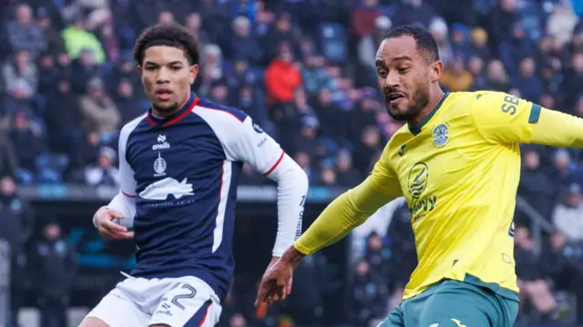 Falkirk's Kyrell Wilson and Hibernian's Jordan Obita