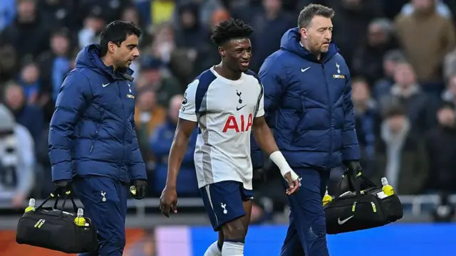 Mohammed Kudus of Tottenham Hotspur walks off injured