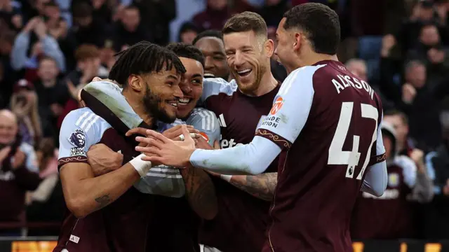 Aston Villa players celebrating