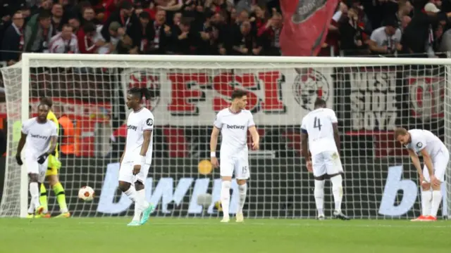 West Ham players look dejected against Bayer Leverkusen