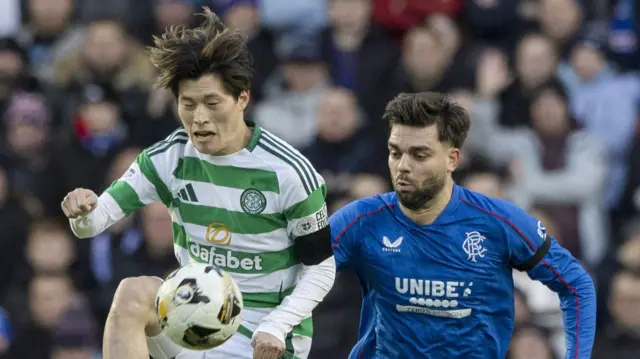 Celtic's Kyogo Furuhashi and Rangers' Robin Propper 