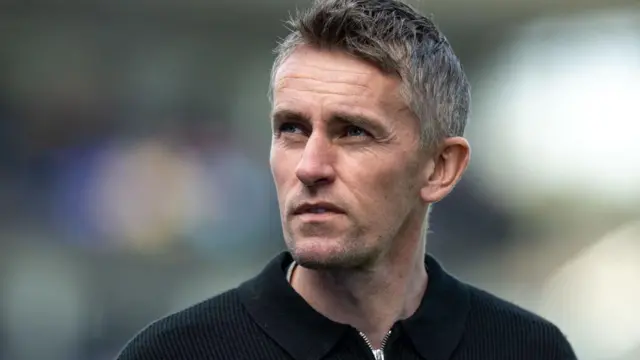 Kieran McKenna looks on thoughtfully