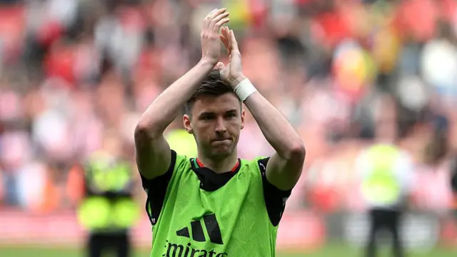 Kieran Tierney of Arsenal applauds the fans, after his final appearance