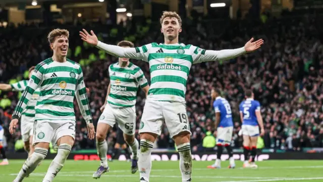 Calum Osmand celebrates after scoring Celtic's third