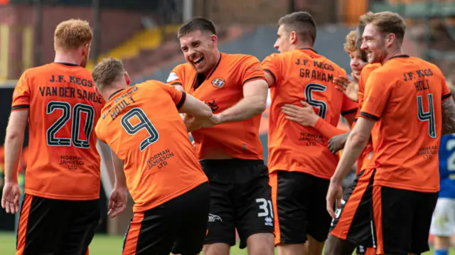 Dundee United players celebrate after St Johnstone's Jack Sanders scores an own goal to make it 2-0 during a William Hill Premiership match between Dundee United and St Johnstone