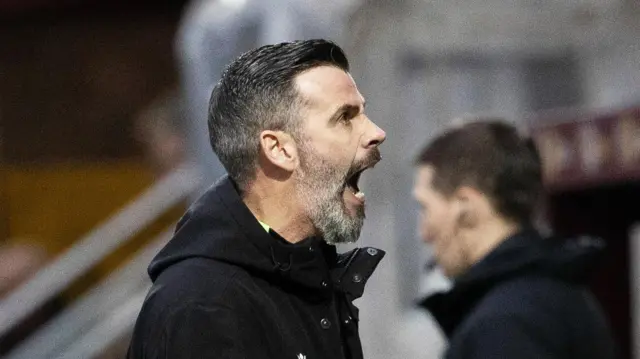 Motherwell Manager Stuart Kettlewell celebrates going 2-0 ahead during a William Hill Premiership match between Motherwell and Rangers at Fir Park