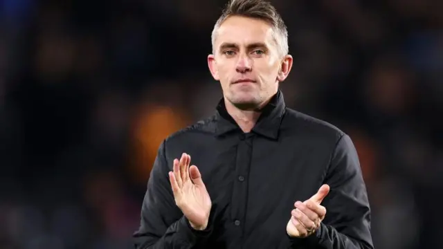 Kieran McKenna applauds after an Ipswich Town match