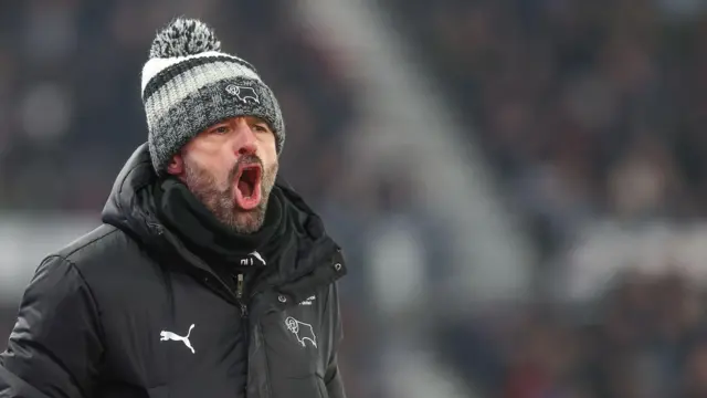 Derby boss Paul Warne shouts instructions to his players during their game against Watford