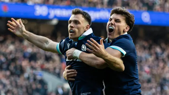 Ben White and Tom Jordan celebrate