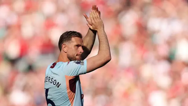 Jordan Henderson of Brentford applauds the fans
