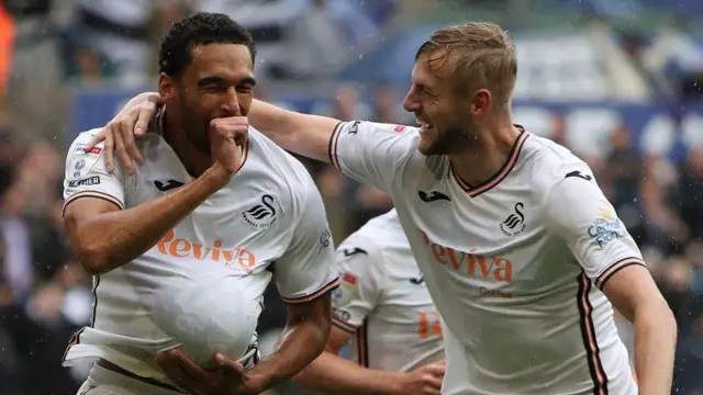 Ben Cabango and Harry Darling celebrate a goal this season