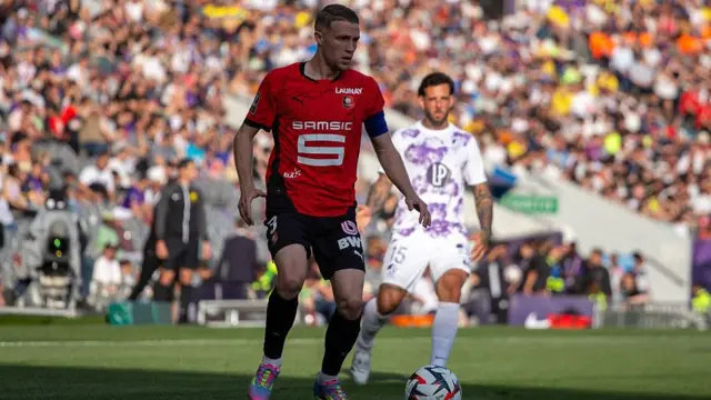 Adrien Truffert in action for Rennes