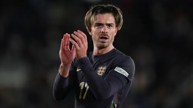 Jack Grealish applauds after an England match