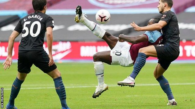 Michail Antonio scores for West Ham against Manchester City in the Premier League