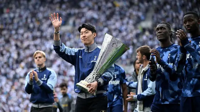 Son Heung-min holds the Europa League trophy
