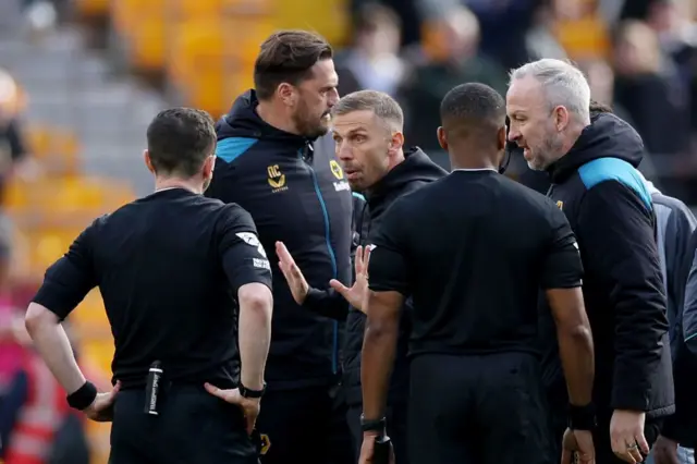 Gary O'Neil argues with referees