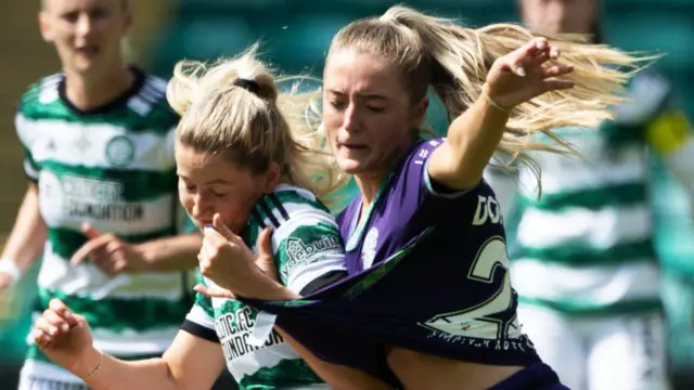 Celtic's Lucy Ashworth-Clifford and Hibs Lauren Anna Doran-Barr in action during a Scottish Power Women's Premier League match between Celtic and Hibernian at Celtic Park
