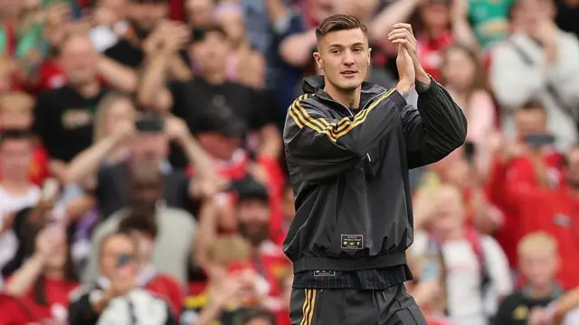 Benjamin Sesko is presented to the crowd before the pre-season friendly match between Manchester United and Fiorentina