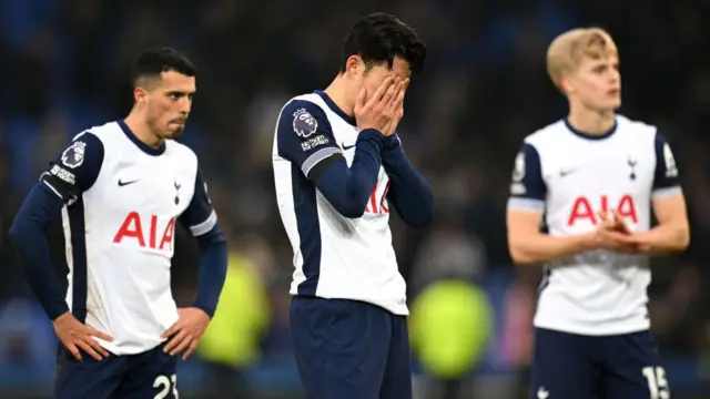 Tottenham's players look dejected following their defeat to Everton