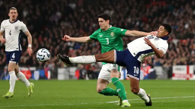 Cardiff's Callum O'Dowda battles Jude Bellingham during the Republic of Ireland's loss to England