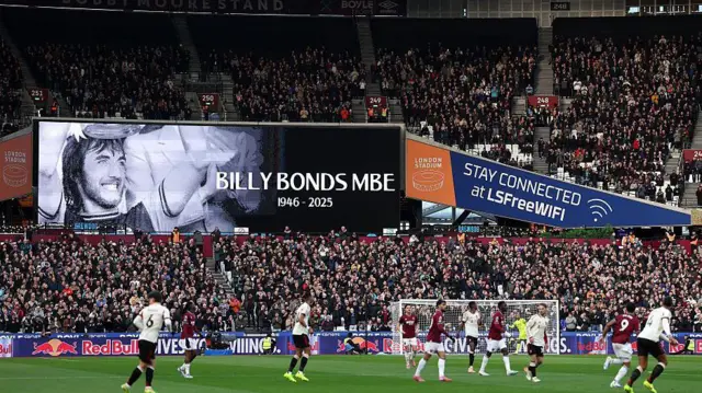 A screen at the London Stadium showing a tribute to Billy Bonds