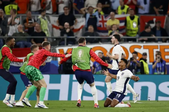 Ollie Watkins celebrates with England players