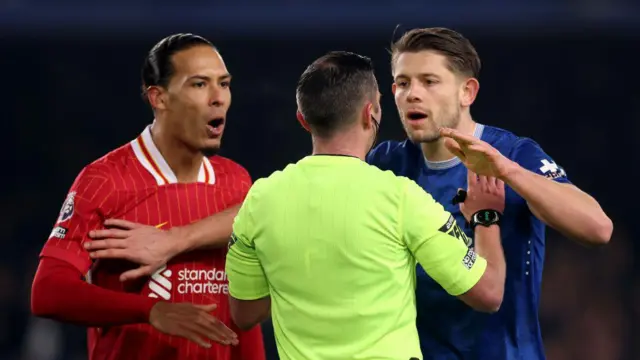 Virgil van Dijk of Liverpool and James Tarkowski of Everton 