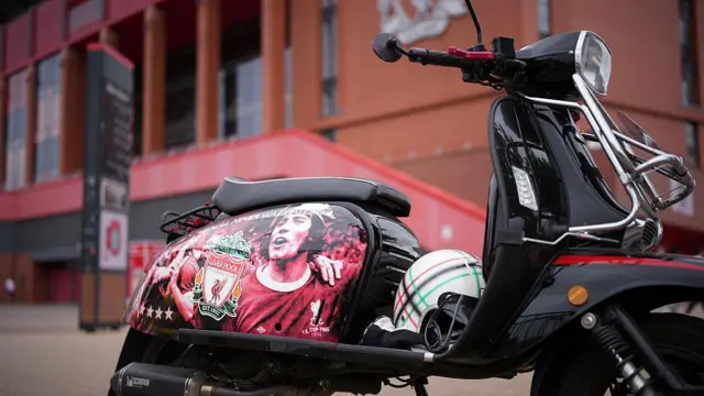 A scooter adorned with images of Kevin Keegan has been left outside Anfield