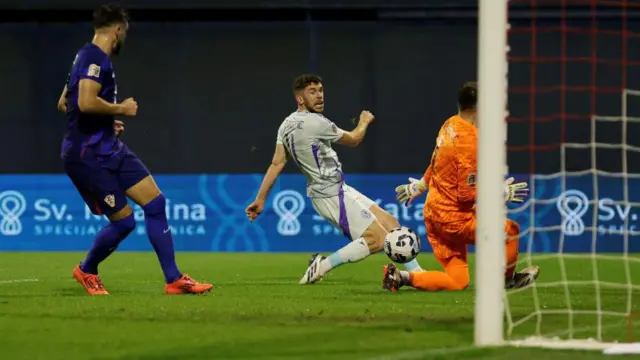 Ryan Christie scores past Croatia goalkeeper Dominik Livakovic