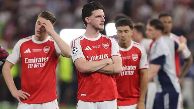Declan Rice, Viktor Gyokeres and Martin Zubimendi looking dejected after Arsenal's Champions League final defeat