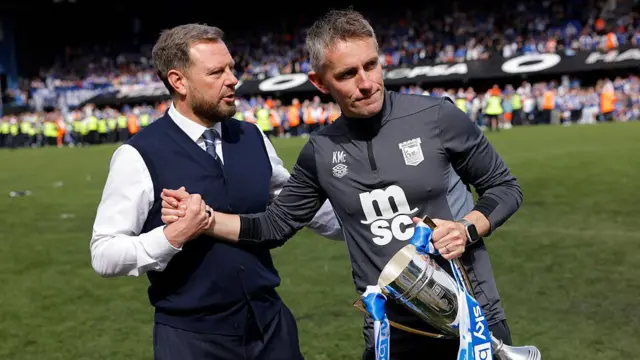 Ipswich chief executive Mark Ashton and Kieran McKenna and the Championship runners-up trophy