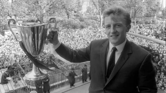 Terry Dyson holding the European Cup Winners Cup Winners trophy