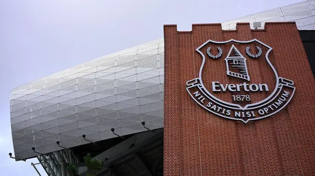Everton's badge on a wall outside Hill Dickinson Stadium