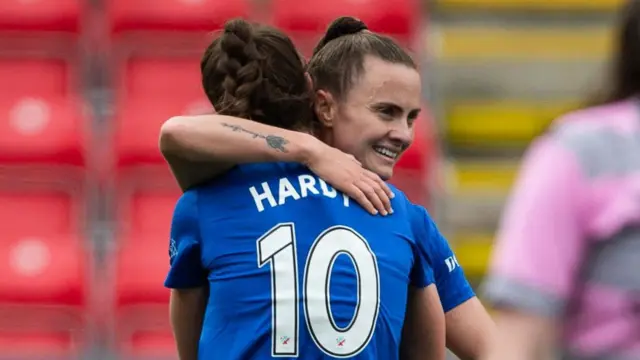 Rio Hardy celebrates with Kirsty Howat