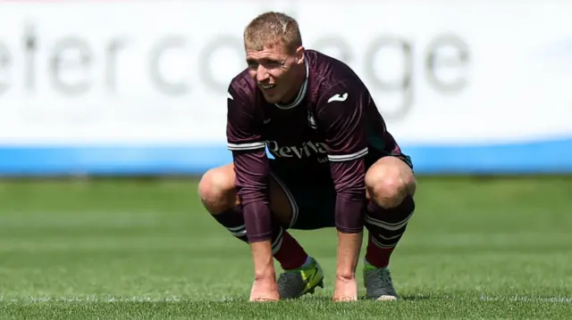 Jay Fulton in action during pre-season 