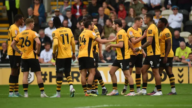 Newport players celebrate Aaron Wildig's goal against Port Vale