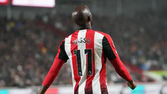 Brentford's Yoane Wissa facing away from the camera