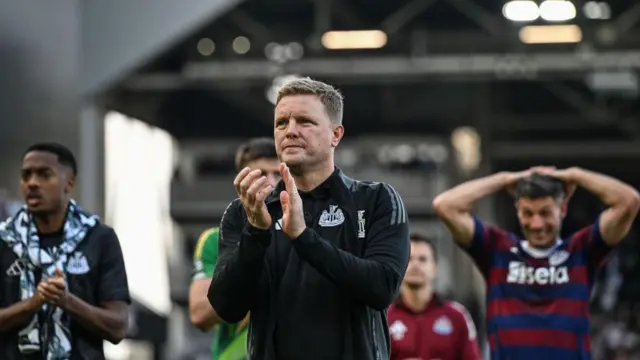 Eddie Howe applauds Newcastle fans following the 3-1 defeat to Fulham.