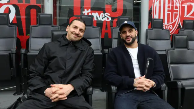 Zlatan Ibrahimovic and Kyle Walker pose for a photo after Walker joins AC Milan