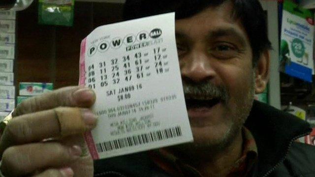 Man holding a lottery ticket