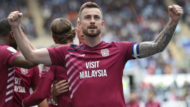 Joe Ralls celebrates Cardiff City's win away to Coventry City